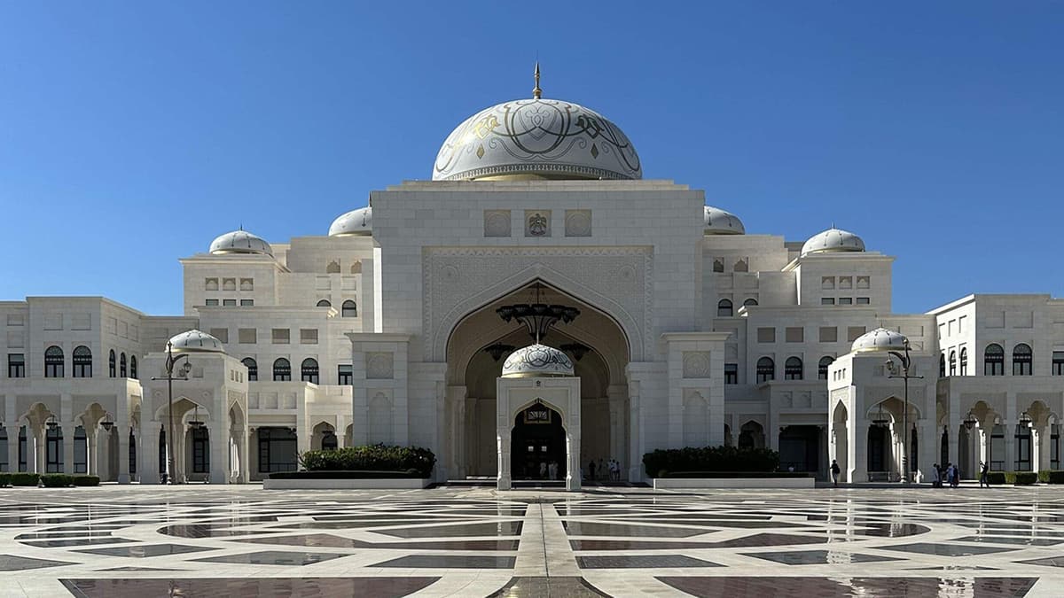 Qasr Al Watan in Abu Dhabi, showcasing its stunning white domes and intricate architectural details.