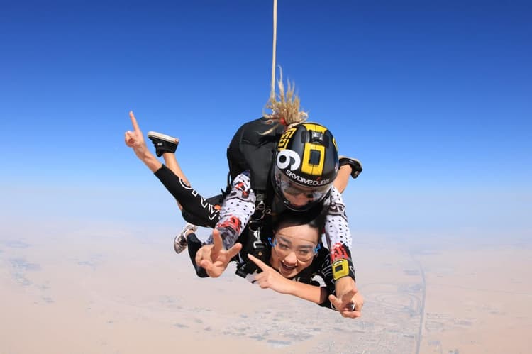 Tourists experiencing skydiving adventure at Skydive Dubai