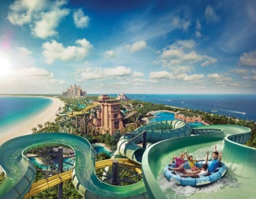 Atlantis Water Park in Dubai features thrilling water slides and attractions surrounded by lush landscapes and vibrant architecture.