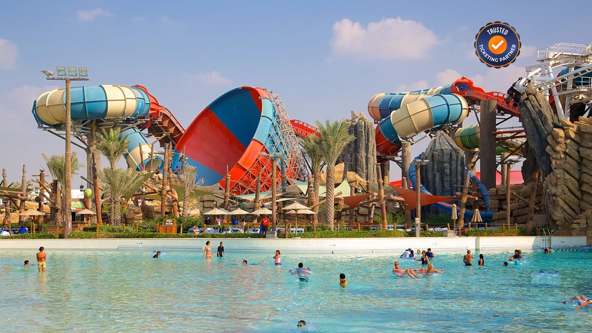 Guests enjoying exciting water slides and attractions at Yas Waterworld Abu Dhabi.