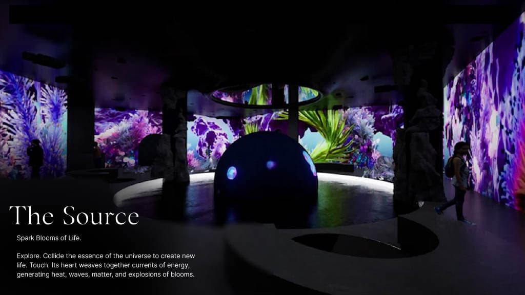 Visitors exploring The Source installation at Aya Universe with glowing light columns and immersive digital effects