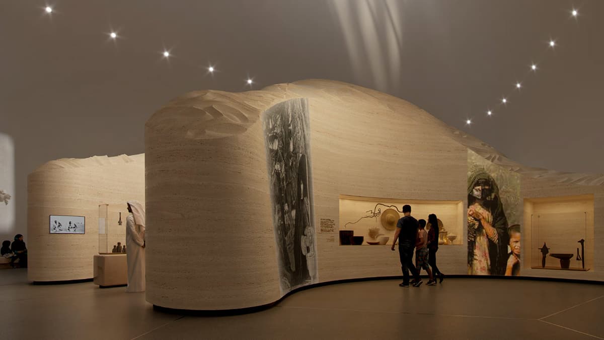 Zayed National Museum Abu Dhabi interior featuring a large wooden structure with several visitors observing it.