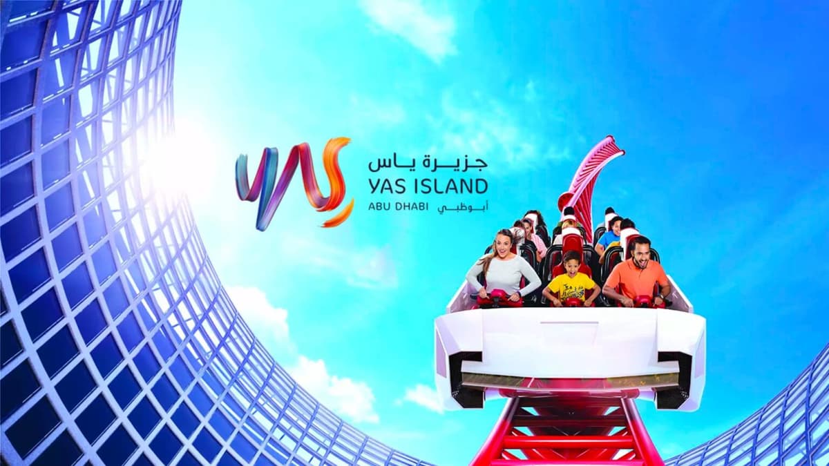 Graphic image featuring the Yas Island logo with a group of people enjoying thrilling rides and attractions