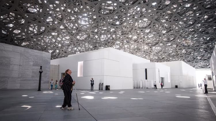 Unique architectural design of Louvre Abu Dhabi featuring the iconic dome and geometric patterns